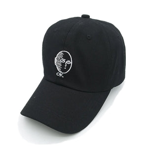 Men and women in cotton baseball caps
